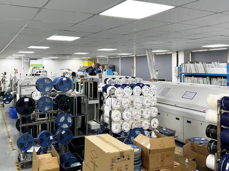 smt assembly workshop with reflow ovens